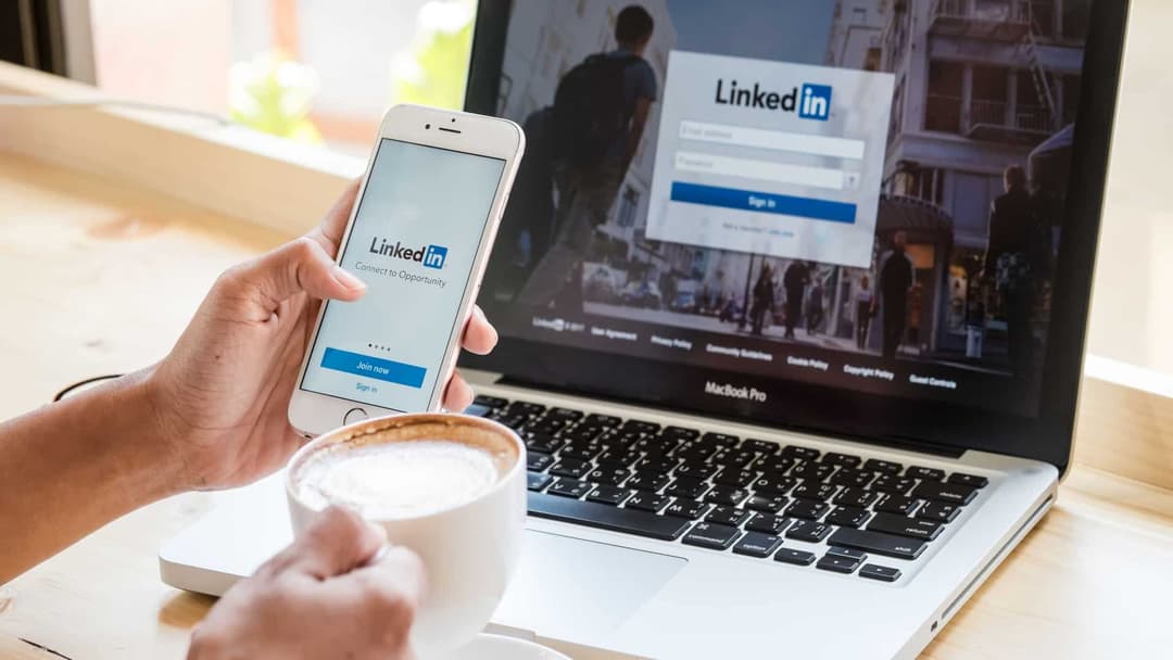 Person working on laptop in modern office